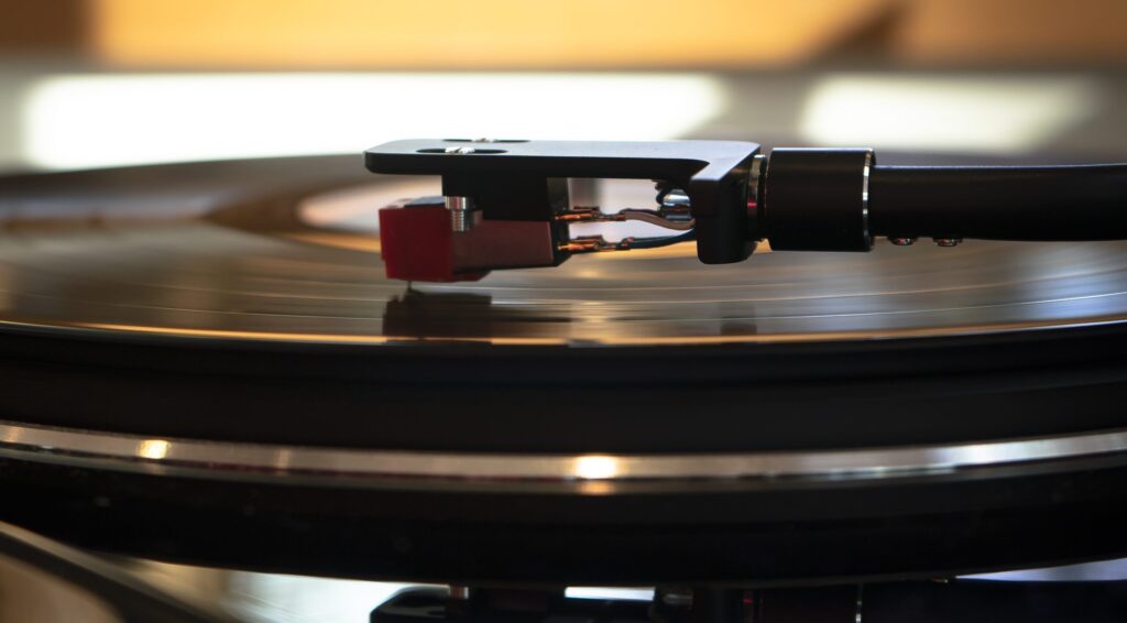 turntable with a vinyl record playing.