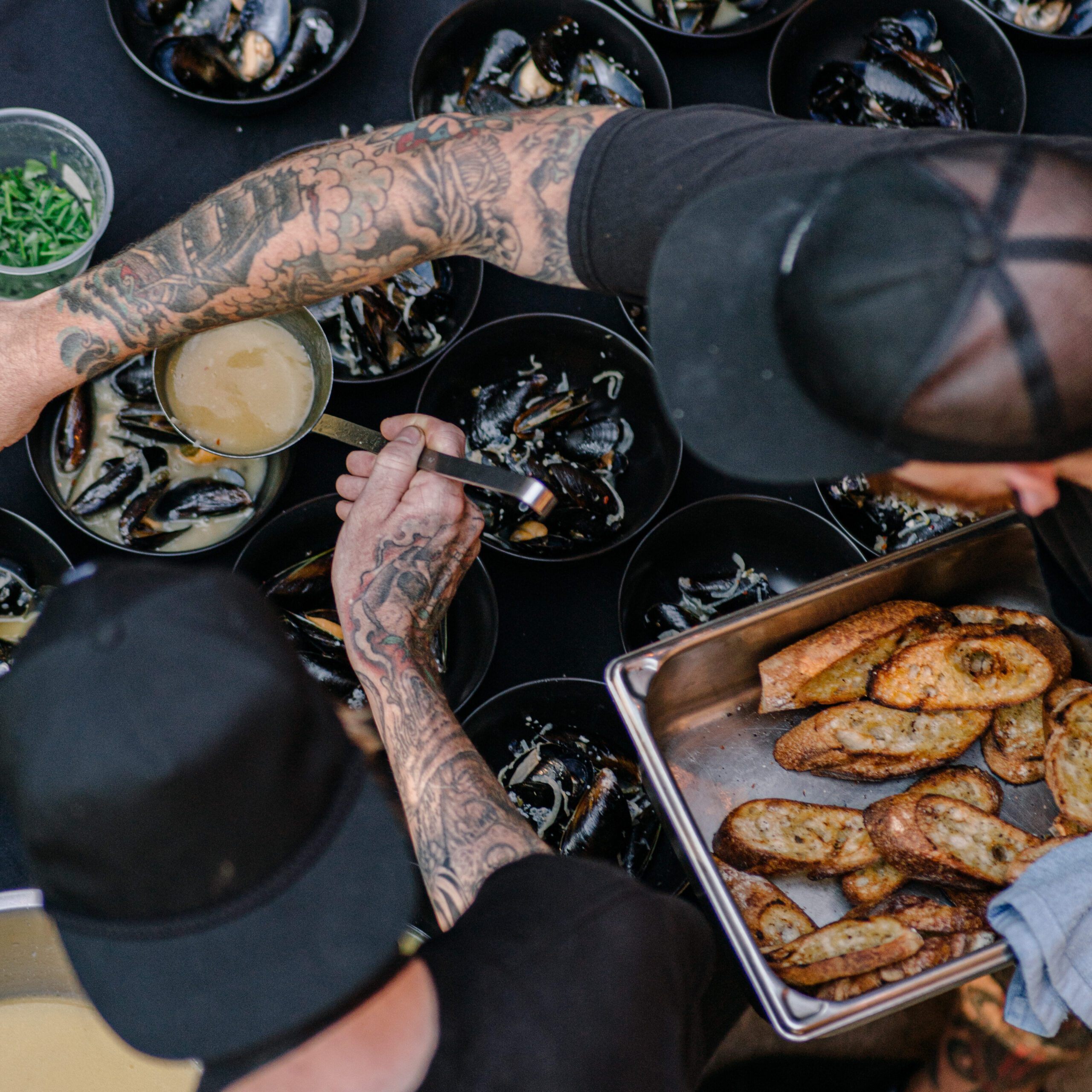 two people preparing food.